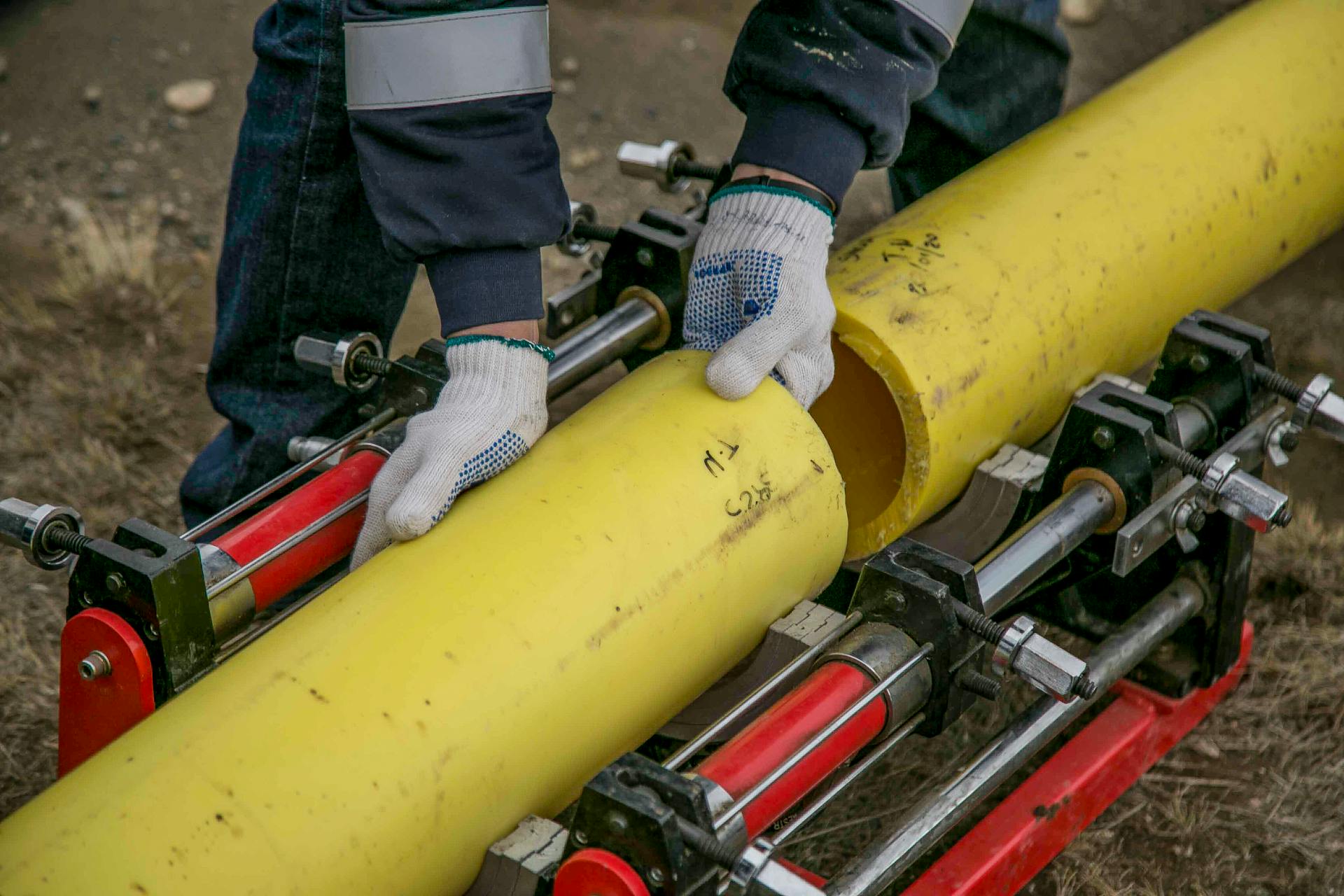 plumber fixing a pipe - Elizabeth Drain and Plumbing Services | Elizabeth, NJ